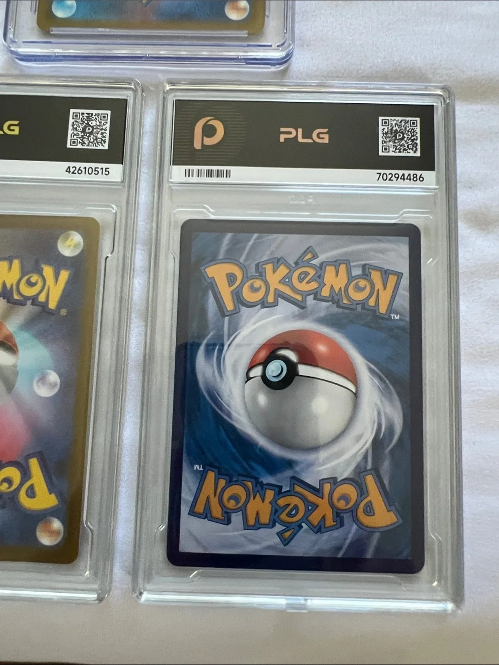 Pokemon Graded Trading Cards — Gold, Black and Purple Accents